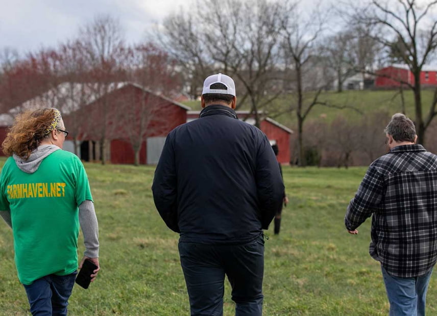 Charles Booker meeting Kentuckians in a rural community
